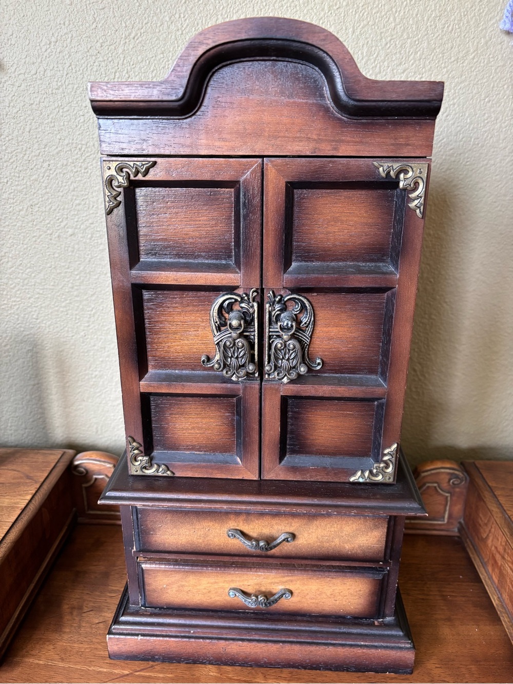 Antique wood jewelry box with drawers and metal hardware